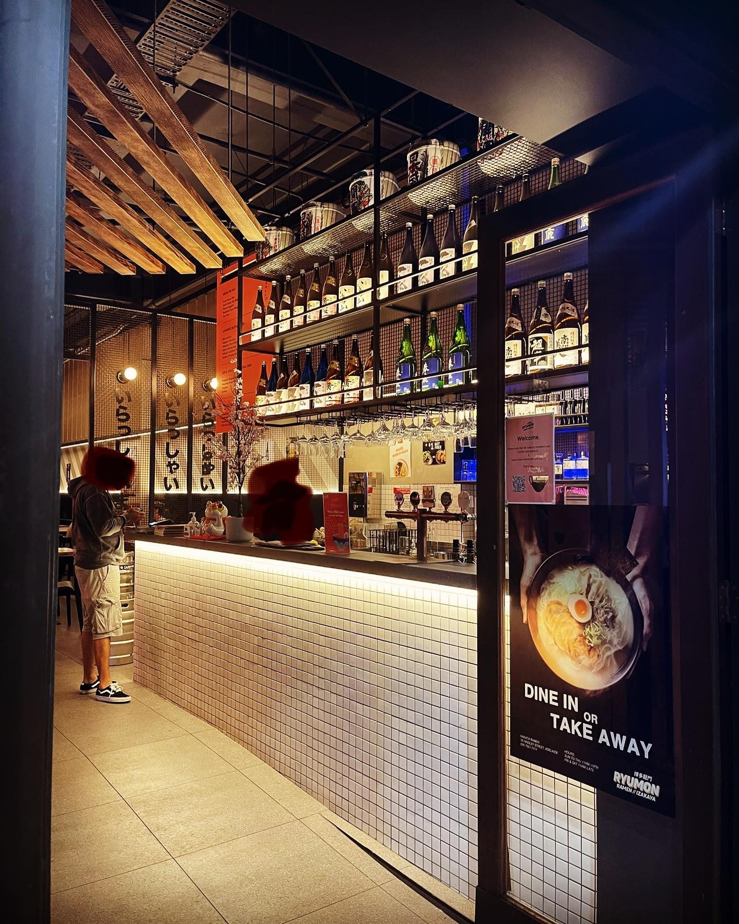 The bar counter seen from the arcade entrance